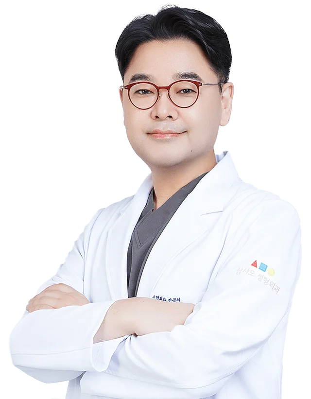 Doctor in lab coat for 345 Plastic Surgery where natural results are achieved.