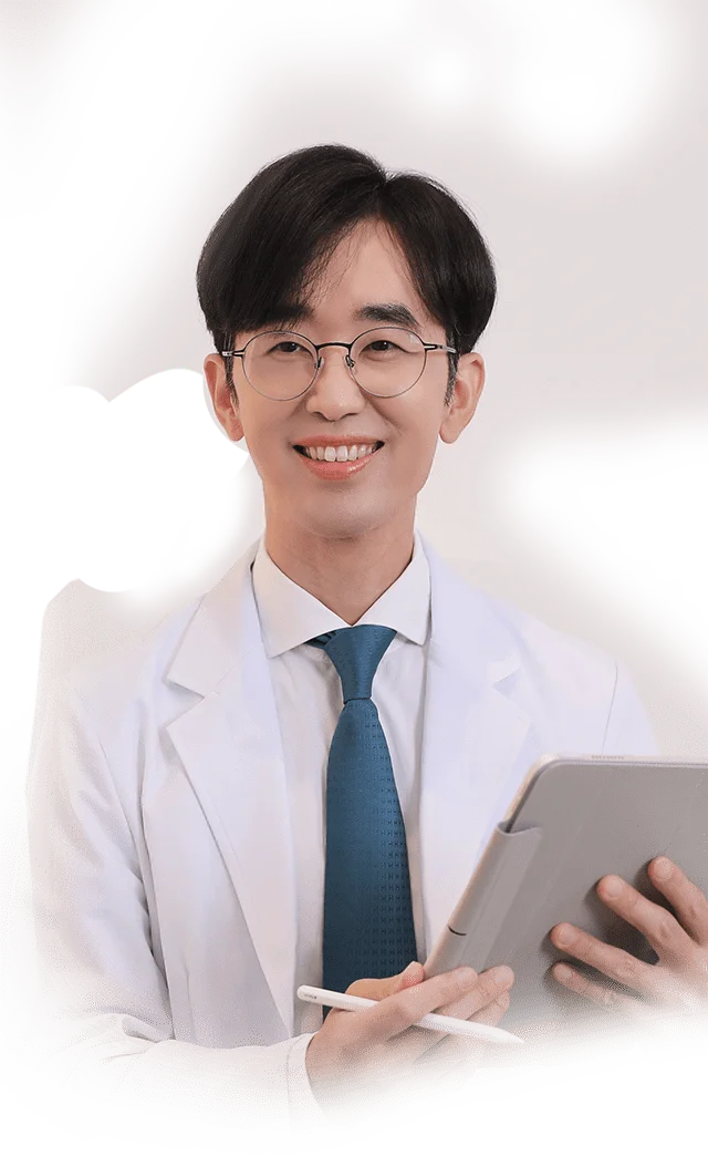 Doctor smiling, holding tablet. 345 Plastic Surgery where natural results are key.
