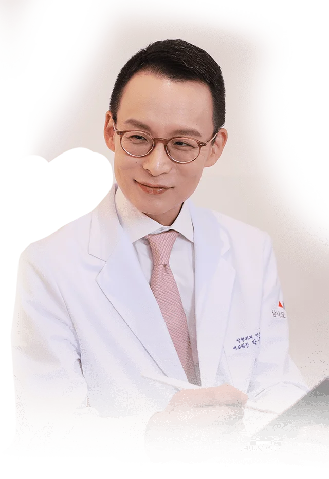 Asian doctor in lab coat. 345 Plastic Surgery where natural.