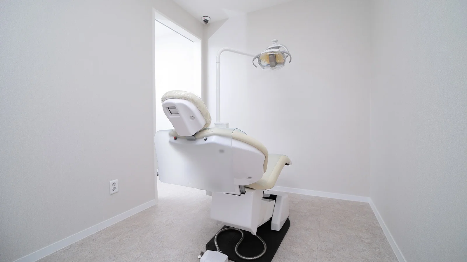 345 Plastic Surgery where natural operating room with surgical chair for cosmetic procedures.