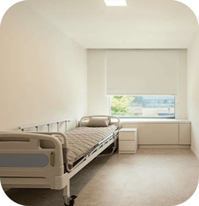 Hospital room with bed for 345 plastic surgery patients where natural results are achieved.